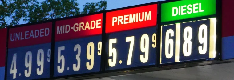 Gasoline and diesel prices displayed on an illuminated station sign in Eugene, Oregon, in September 2026.