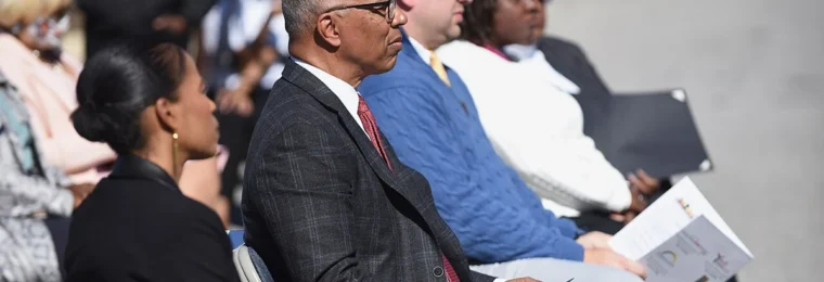 Attendees seated outdoors at the grand opening of the American Job Center in National Harbor, Maryland.