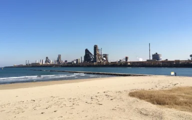 POSCO steelworks across the water from Songdo Beach in Pohang, South Korea.
