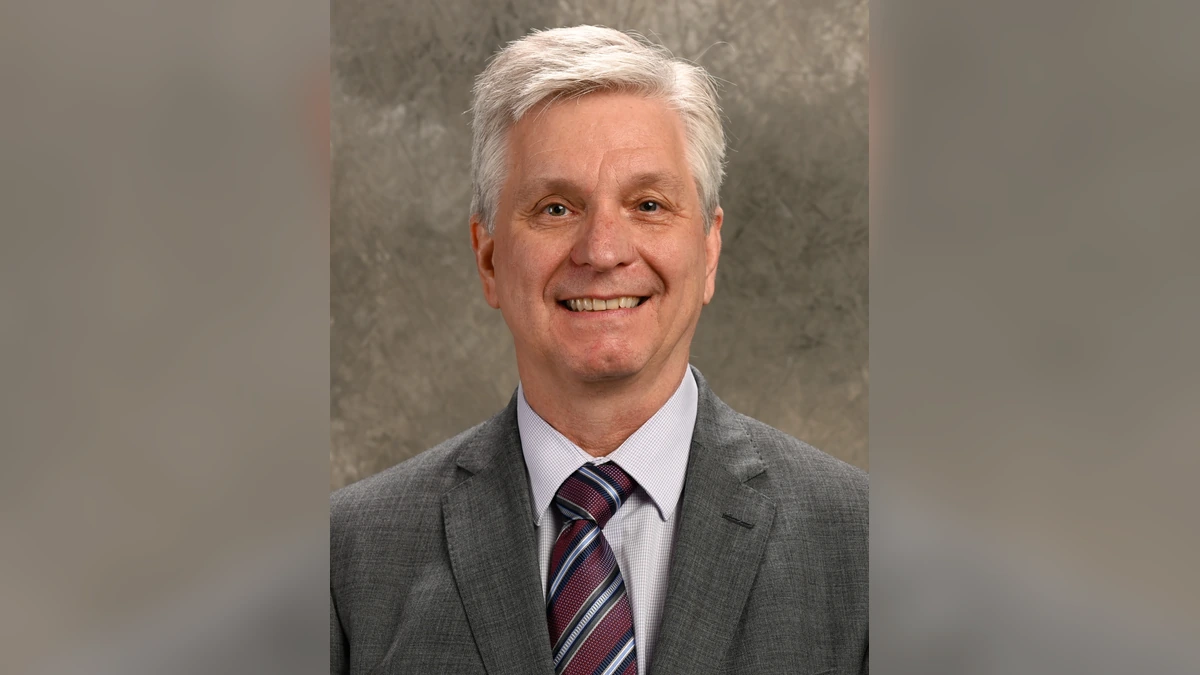 Federal Reserve Governor Christopher Waller in an official portrait.