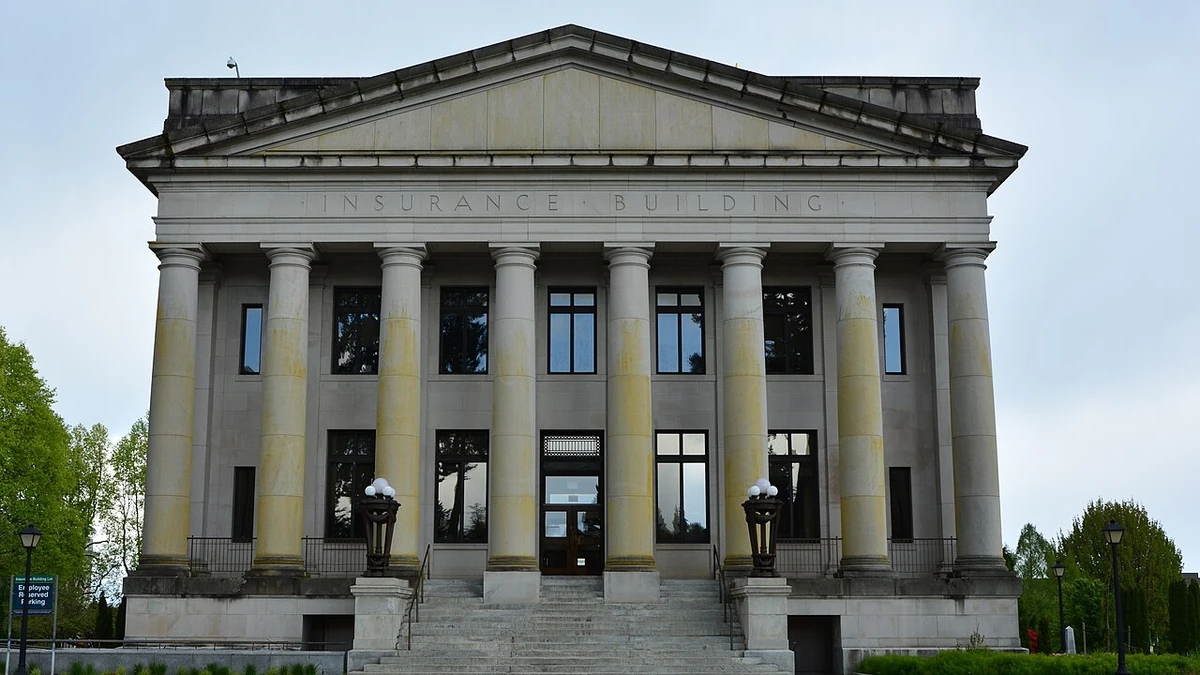 Front facade and stone columns of the Insurance Building on the Washington State Capitol campus in Olympia.